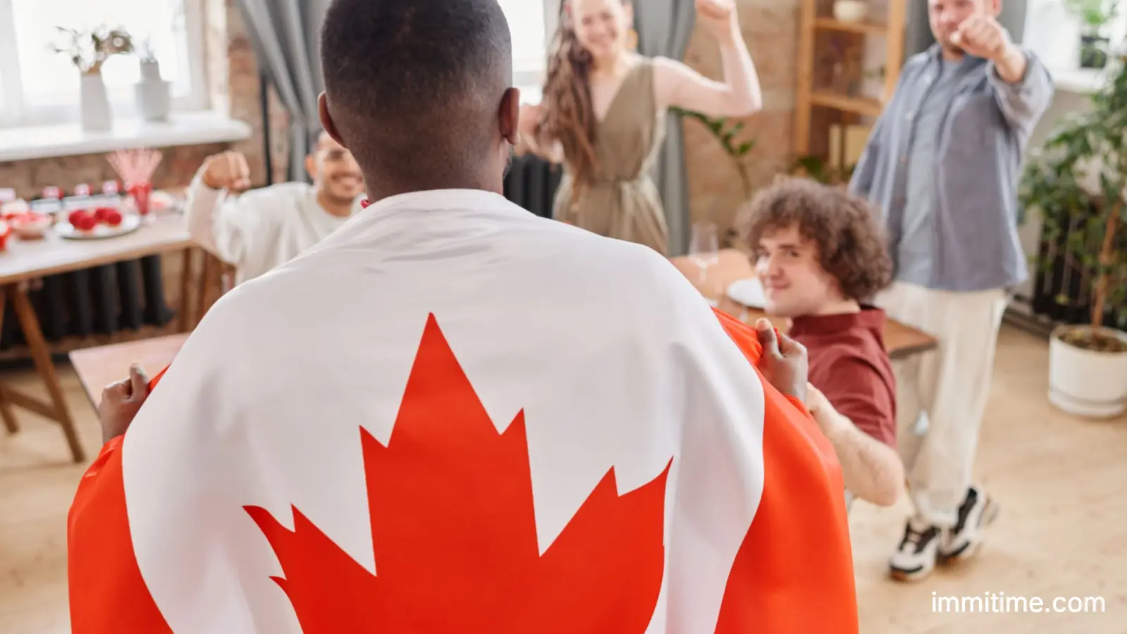 Diverse family holding Canadian flags, representing inclusive Canadian citizenship laws for non-biological parents.